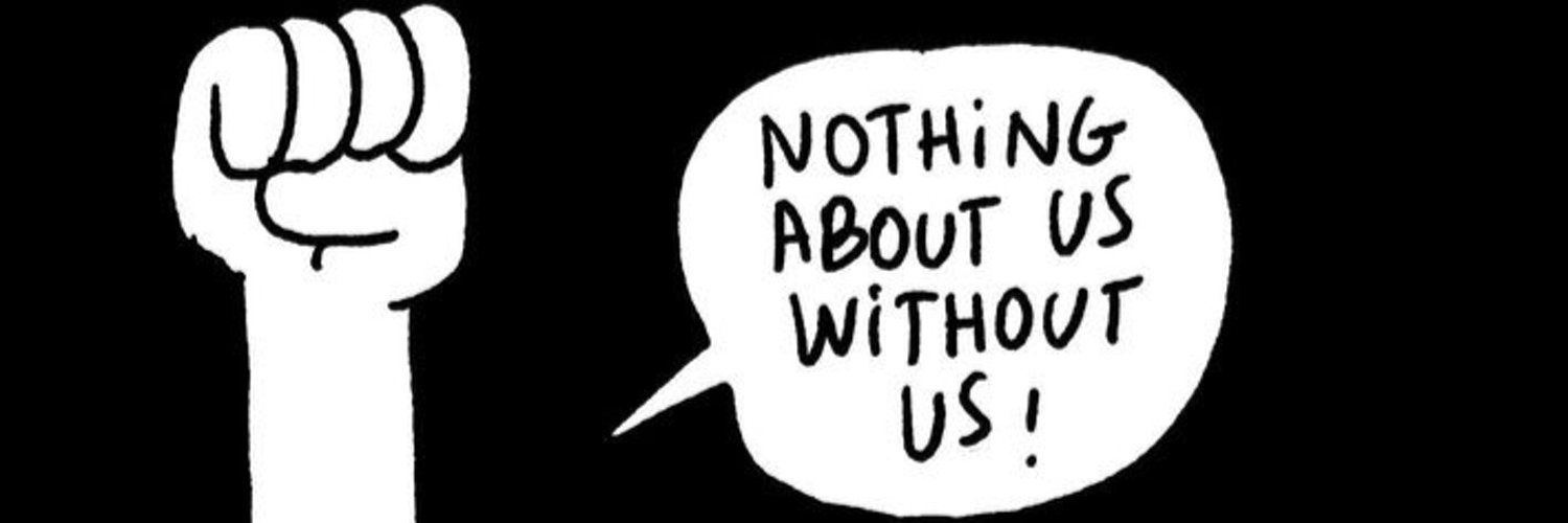 dessin d'un point levé et d'un phylactère dans lequel est inscrit Nothing About Us Without Us